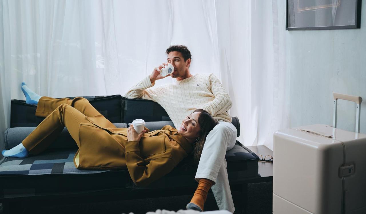 Lancemore Crossley St. Мельбурн Экстерьер фото A couple relaxing at home